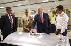 Mr. Adrien Larsen is the Division Chief of the Rapid Sustainment Office, Air Force Life Cycle Management Center; Brian Stitt Division Head, Sustainment Technologies Transition, and Ronen Lebi, Chief Business Officer at Machina Labs brief Ambassador Whitaker on a RoboFormed replacement part for a C-130 Hercules at a new University of Dayton Research Institute production facility.